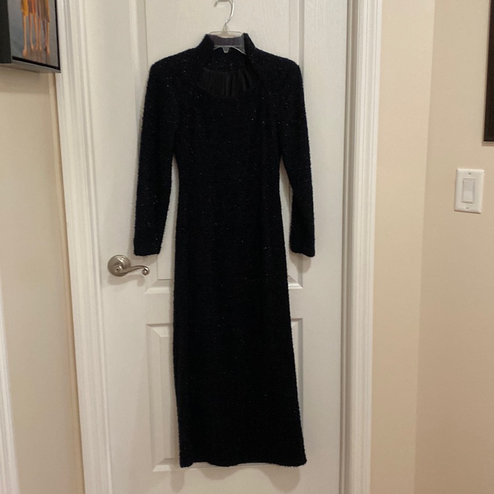 Beautiful evening dress with slit in the back.